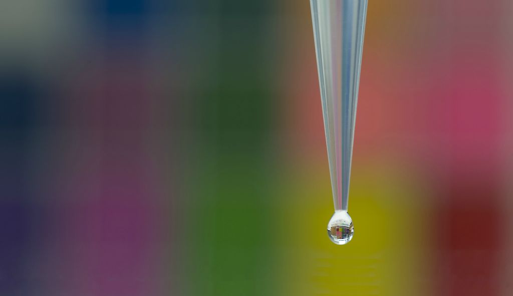 I photographed a simple drop of water to suggest all the chemistry and physics happening on the surface of that drop in order for it to form.  Felice Frankel